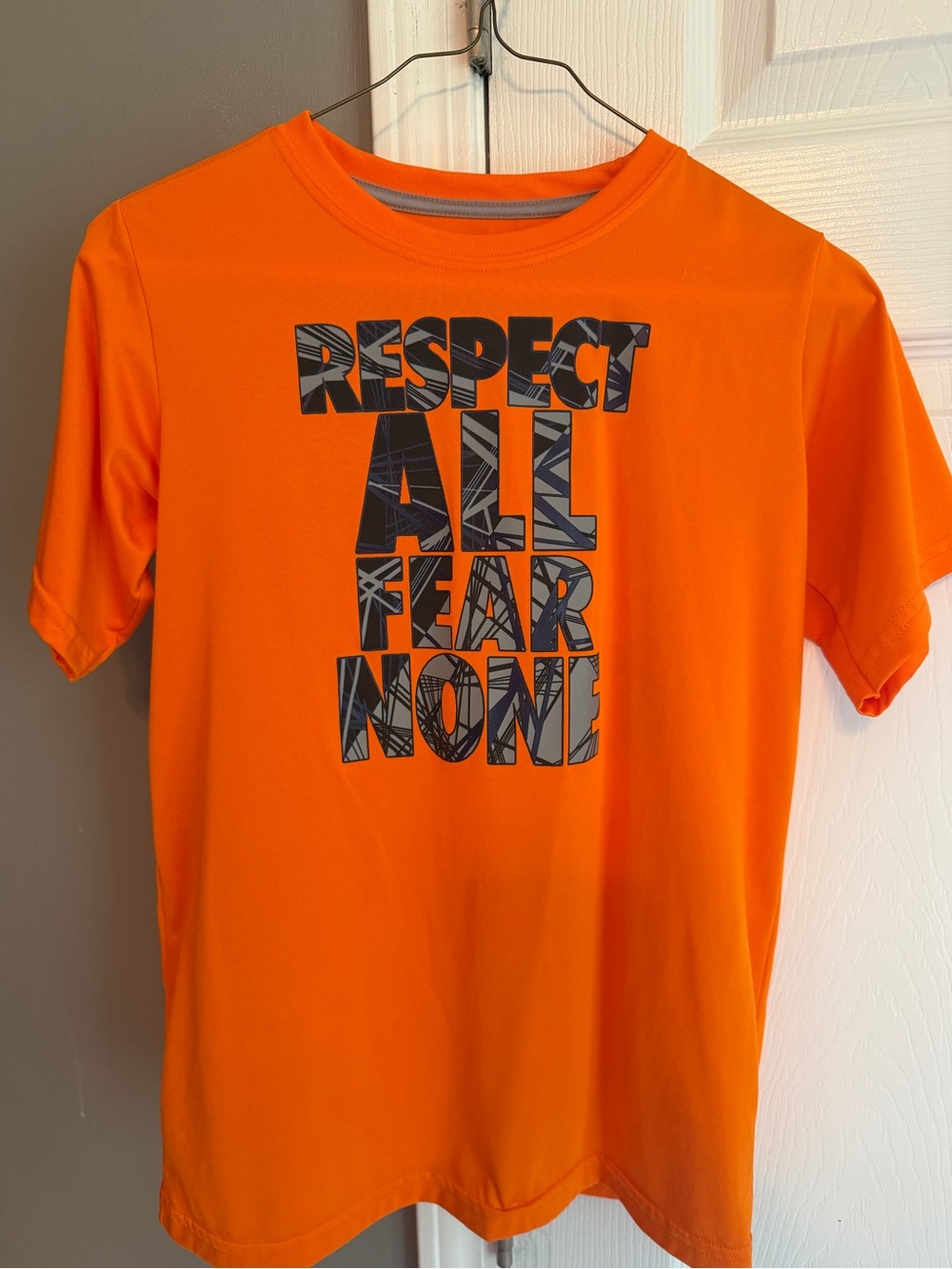 bcg Orange Short-Sleeve drifit athletic Graphic Tee with Black ‘Respect All Fear